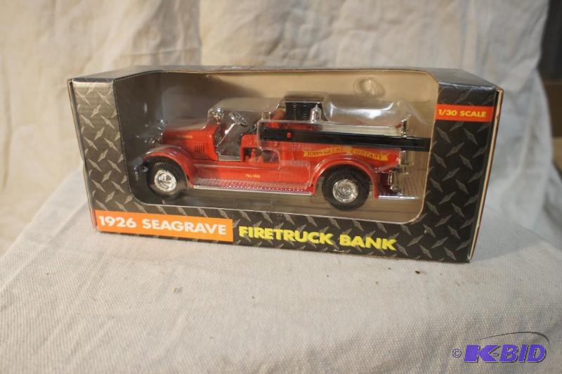 lot 24 image: New Seagrove Fire Truck Bank - #5710 - 130 S...