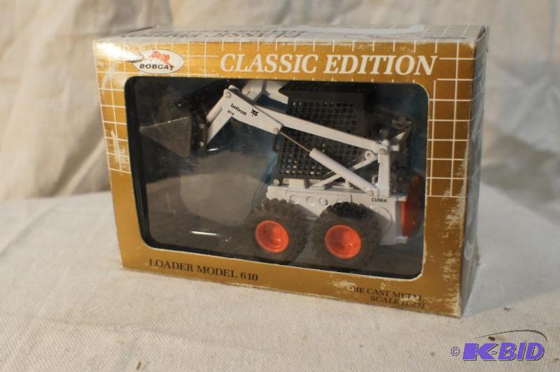 lot 25 image: New In Box Classic Edition Melroe Loader Mode...