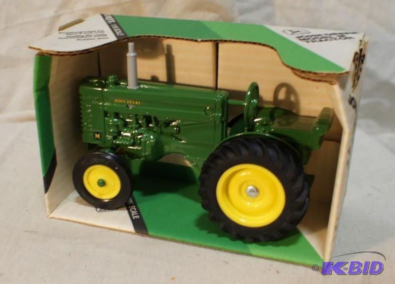 lot 51 image: New In Box John Deere Model &quotM" Tra...