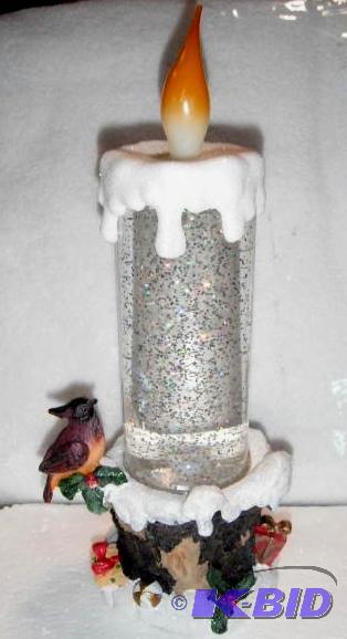 lot 18 image: Multi Colored Lights Snow Globe Candle - New...