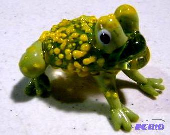 lot 75 image: Green Hand Made Glass Frog- 2" x 2"...