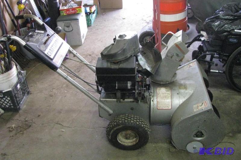 lot 132 image: Craftsman Snow Blower the engine runs fine bu...