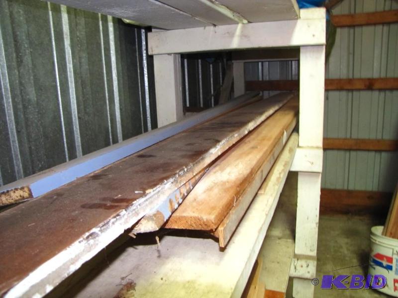 lot 191 image: Shelf lot of wood, various sizes, longer piec...