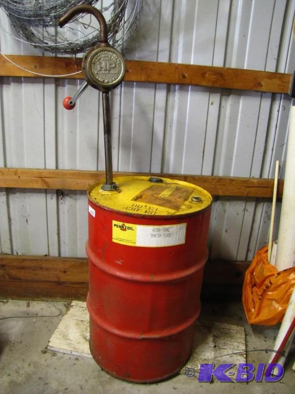 lot 205 image: 30 Gallon Oil Drum w Pump. Pennzoil Tractor ...