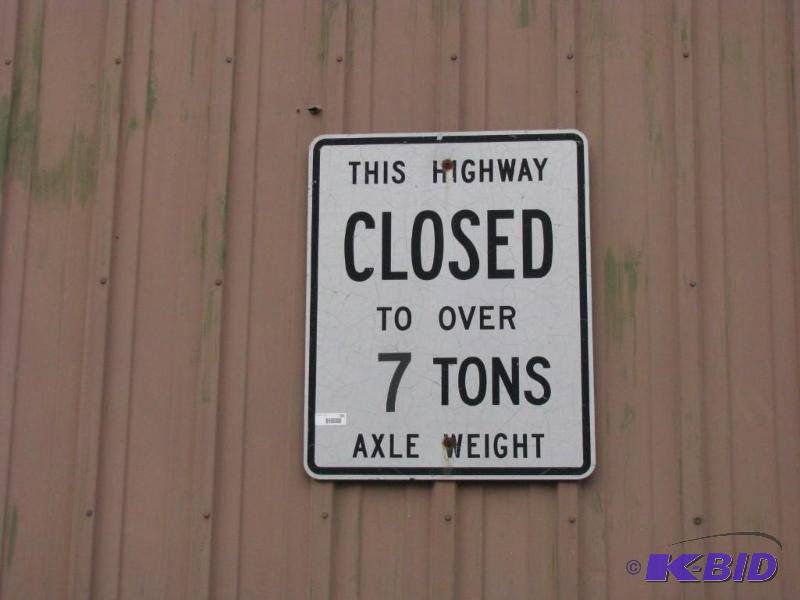 lot 261 image: vintage metal highway sign. This highway clos...