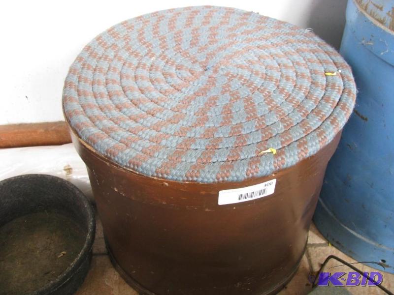 lot 300 image: wooden container, with rolled rag rug on top ...