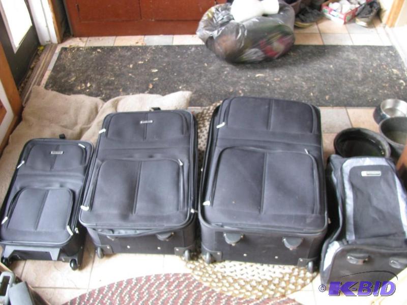 lot 338 image: luggage set and rolling bag...