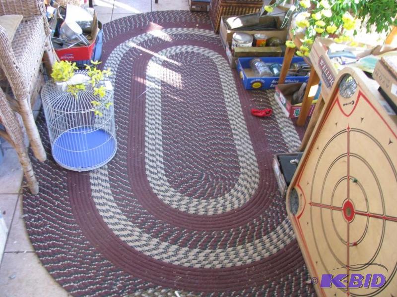 lot 347 image: two oval braided rugs large one is 100" ...