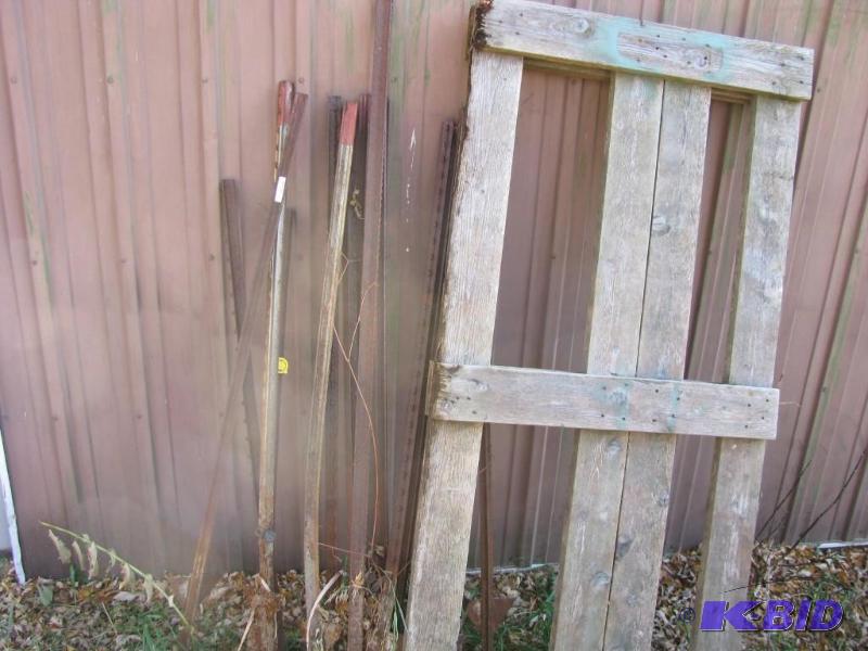 lot 357 image: electric fence poles (11) and wooden fence g...