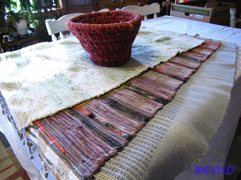 lot 36 image: 3 rag rugs and 1 rag basket. Good condition...