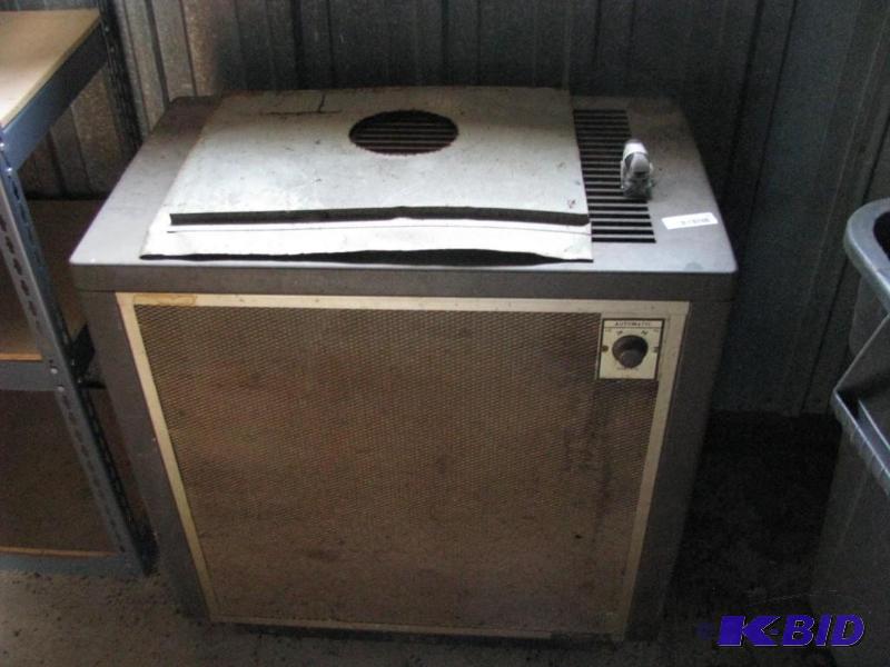 lot 53 image: Wood Burning Furnace has been stored indoors ...