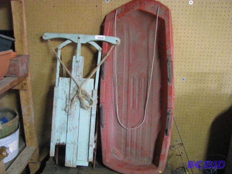 lot 89 image: Two vintage sleds, one wood & one plastic...