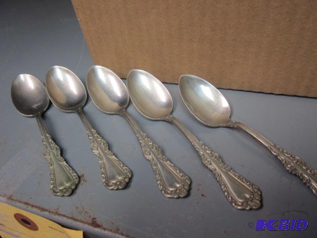 lot 10 image: Lot of (5) spoons, marked Alaska Silver. ...