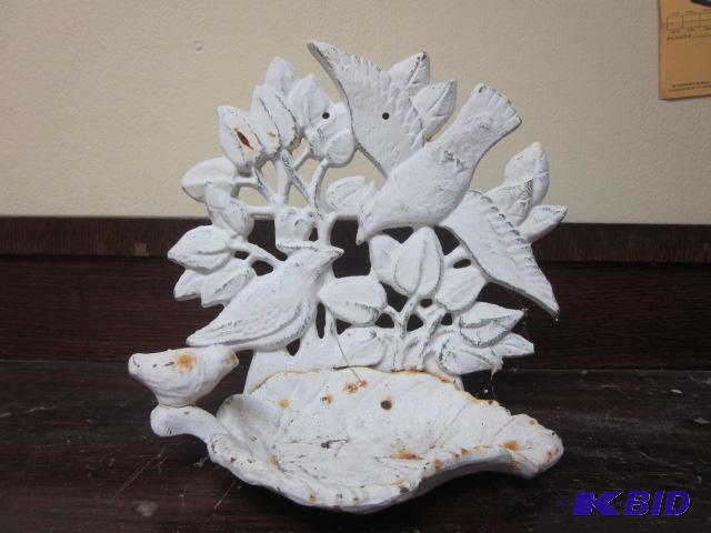 lot 12 image: 9 inch cast iron wall decor....