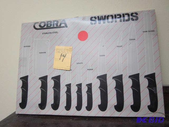 lot 14 image: New in box Cobra knives. ...
