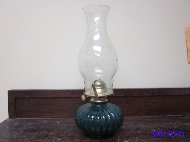 lot 141 image: Oil lamp....