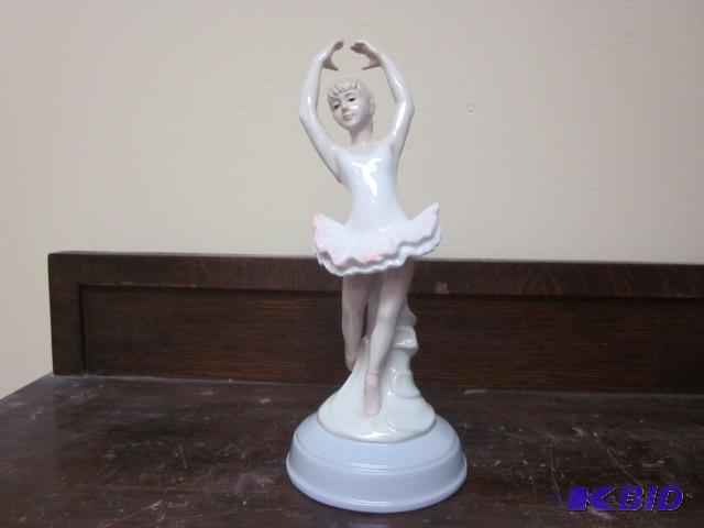 lot 26 image: 9 inch porcelain music box dancer, no chips o...