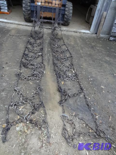 lot 15 image: 18.4-34 tractor tire chains. Came off the 706...