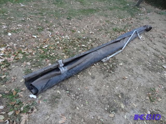 lot 25 image: Roll tarp off of a 14 dump truck box....