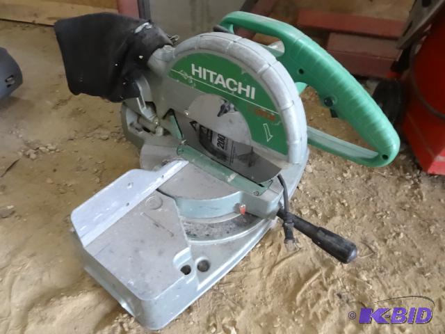 lot 33 image: Hitachi 10" miter saw. Works...