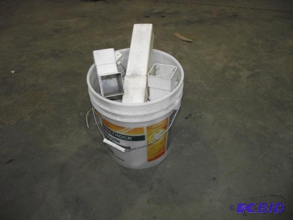 lot 133 image: 5 gallon pale full of square gutter connecter...