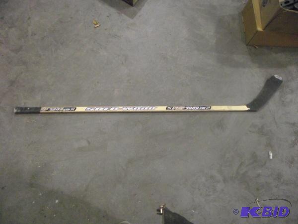 lot 46 image: Left Handed Hockey Stick...