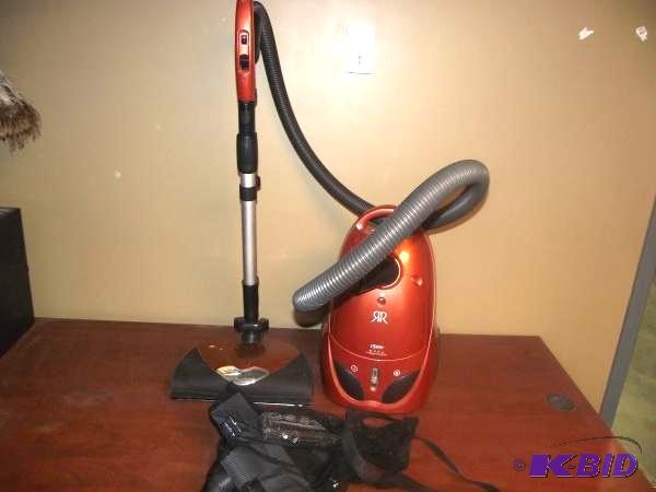 lot 92 image: Small Vacuum Cleaner With Attachments...