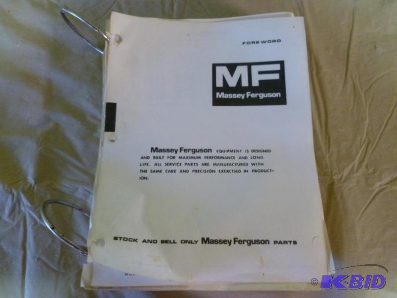 lot 105 image: Large Massey - Ferguson parts binder book....
