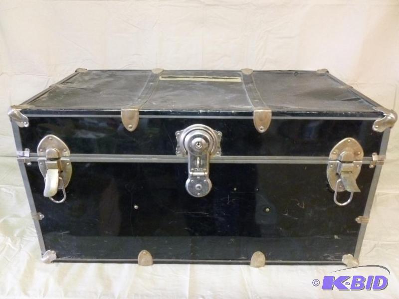 lot 24 image: Large vintage metal shell storage trunk that ...