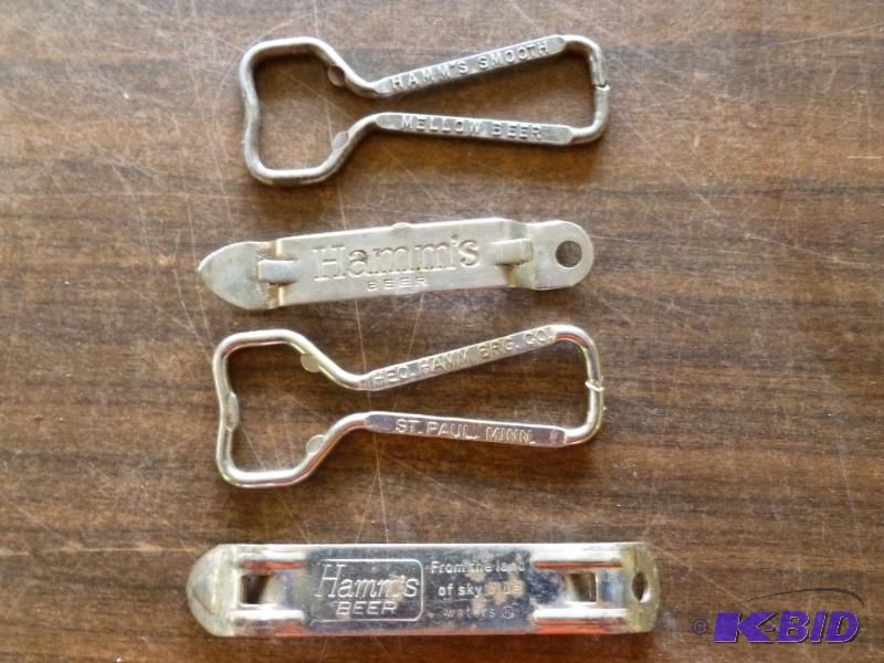 lot 46 image: Lot of four vintage Hamms metal bottle opene...