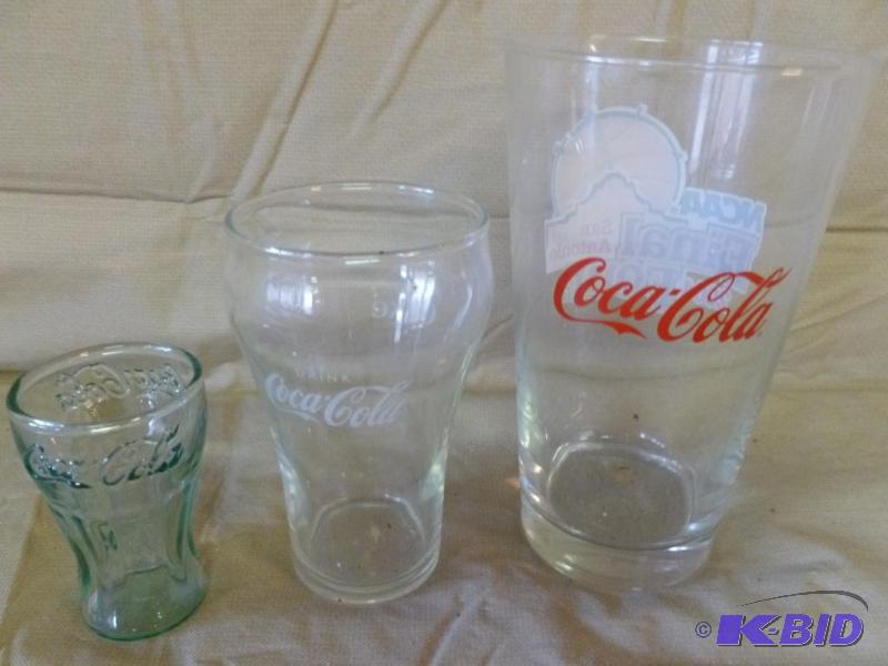 lot 49 image: Lot of three collectible Coca-Cola soda glass...