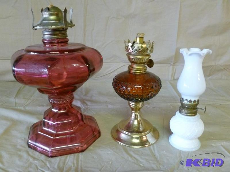 lot 56 image: Lot of three vintage oil lamps, two of them d...