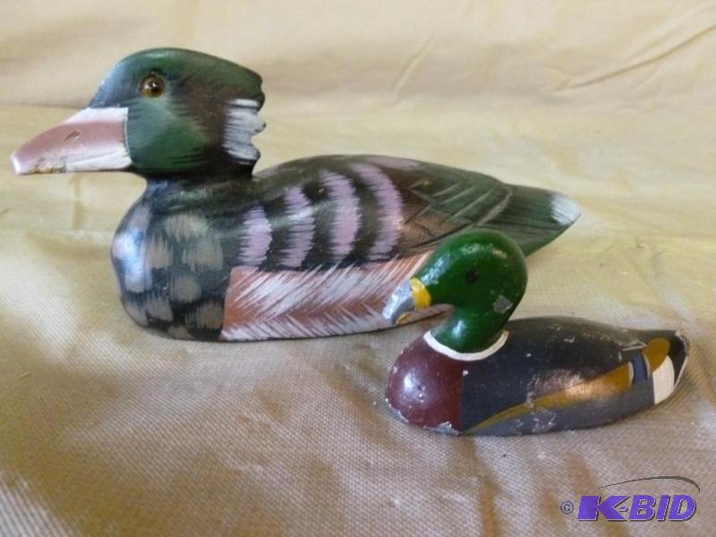 lot 58 image: This lot consists of a hand painted wooden du...