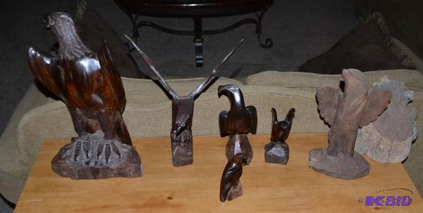lot 107 image: Hand carved Ironwood Eagles set. The tallest ...