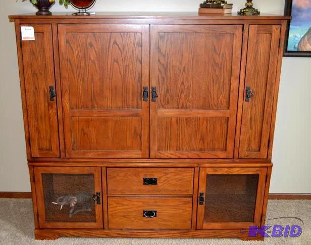 lot 17 image: Wood entertainment center with side storage f...