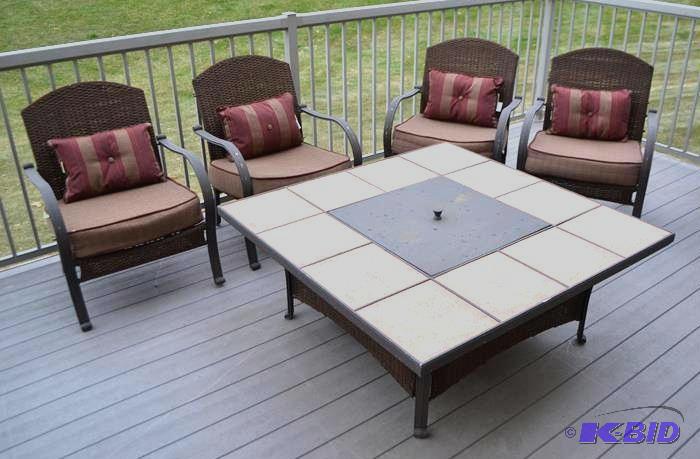 lot 24 image: Patio set 4 chairs and table 50x50x16&quot T...