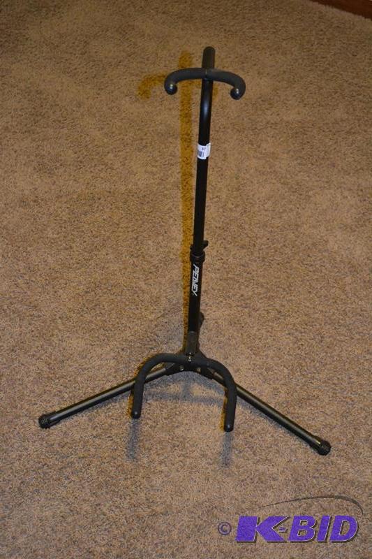 lot 37 image: Peavey adjustable guitar stand...