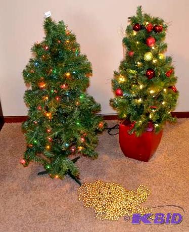 lot 47 image: Two decoratedlighted Christmas trees 46&quot...