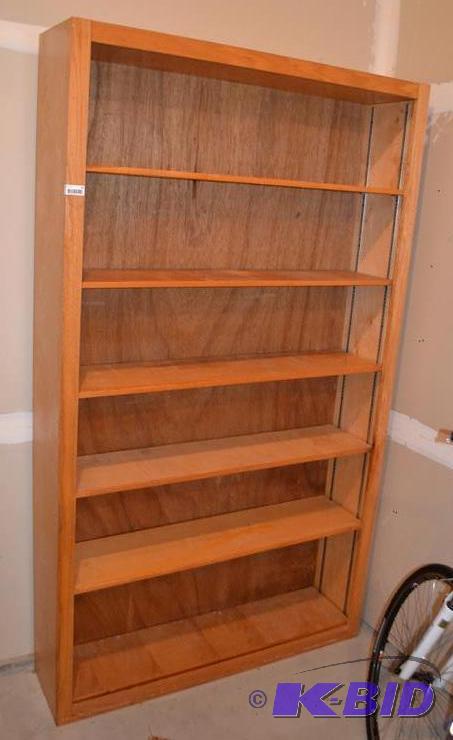 lot 53 image: Large wood book shelf with adjustable shelves...
