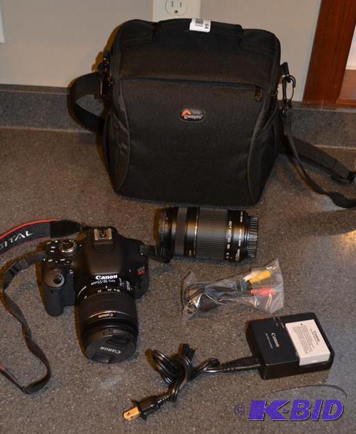 lot 64 image: Canon EOS Rebel T3i camera in working conditi...