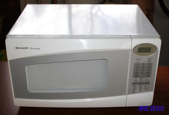 lot 82 image: Sharp microwave R-308JW Call 651-434-0072 to ...