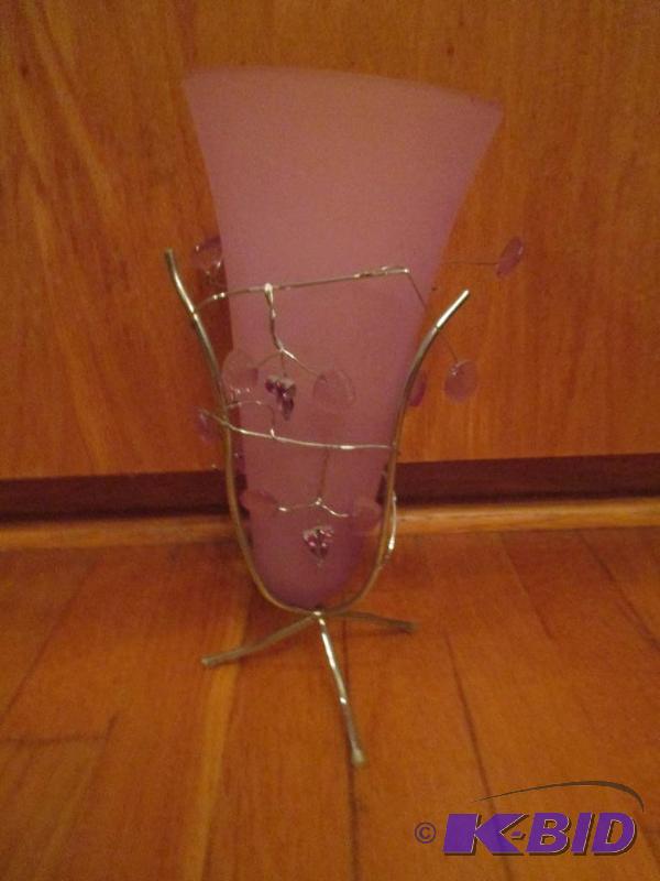 lot 10 image: Purple Vase held in a metal frame...