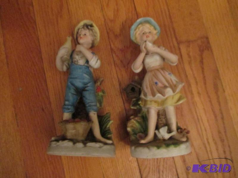 lot 16 image: Home Interiors Farm Boy and Farm Girl Statues...