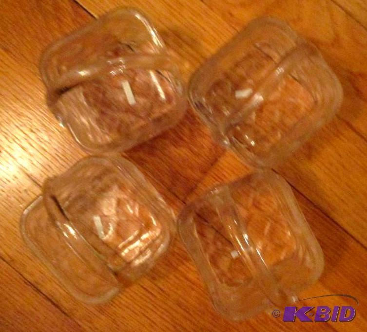 lot 28 image: Set of 4 glass baskets...