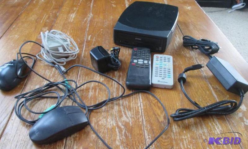 lot 47 image: lot of cords, misc remotes and a disc drive...
