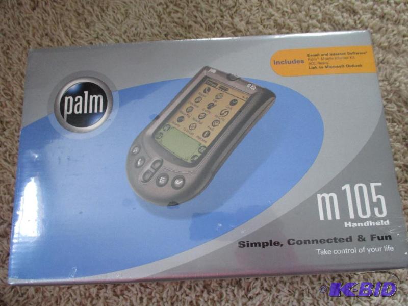 lot 54 image: Palm Pilot- new in the box m 105...