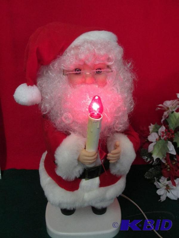 Santa holding a Candle - waves it back and forth