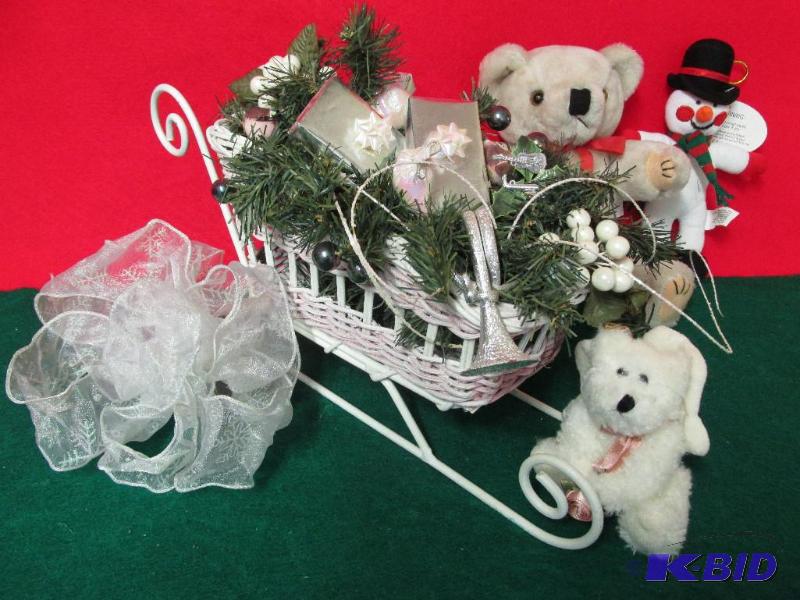 Adorable White Wicker Sleigh filled with presents 