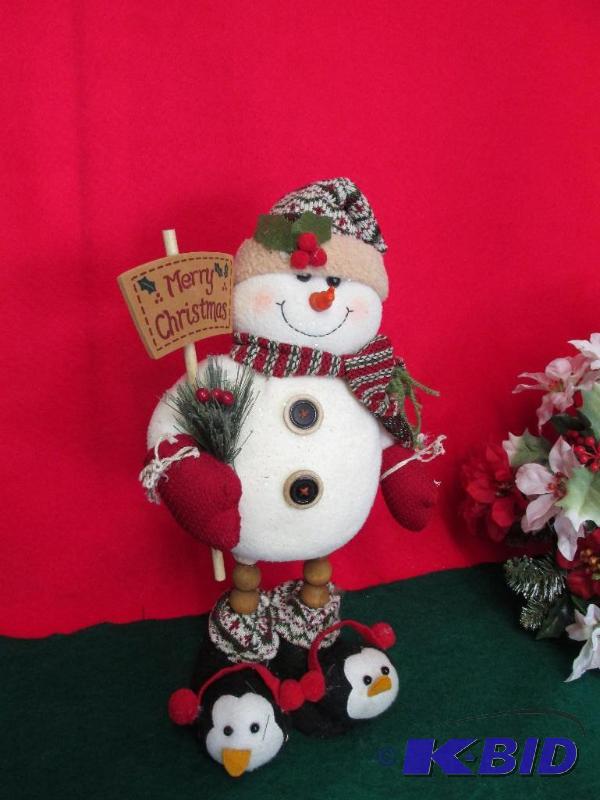 Snowman with Penguin Slippers wishing everyone a Merry Christmas