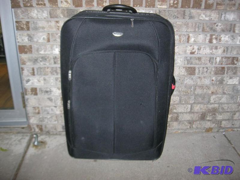 Large Bonjour Suit Case, May Show Some Wear...